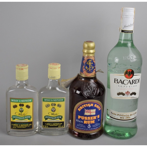 148 - Four Bottles of Rum to include Bacardi, British Navy Pusser's Rum, White Overproof Rum