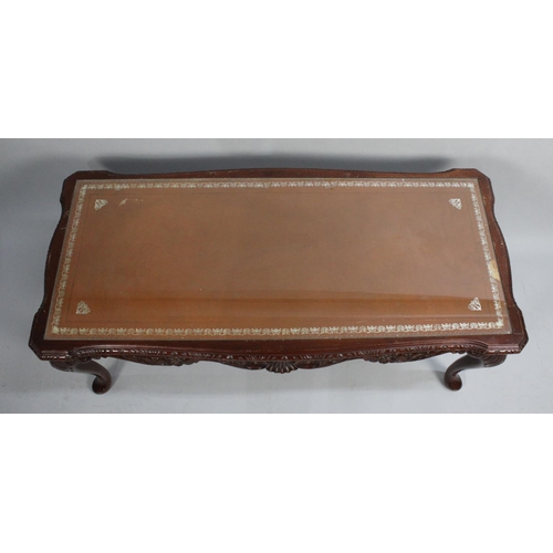 206 - A Modern Mahogany Framed Rectangular Coffee Table with Tooled Leather Top, 107cms Long