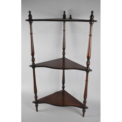 213 - A Modern Mahogany Three Tier Corner Whatnot, 44cms Wide