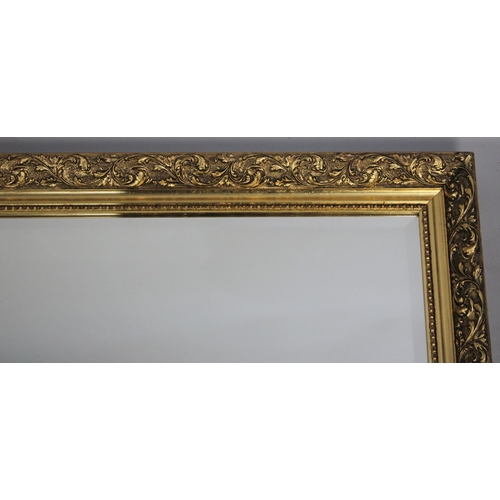 225 - A Modern Gilt Rectangular Wall Mirror, 84cms by 62cms