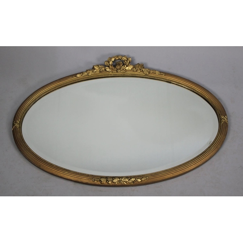 229 - A Mid 20th Century Gilt Framed Oval Wall Mirror, 72cms Wide together with a Vintage Bevel Edged Mirr... 