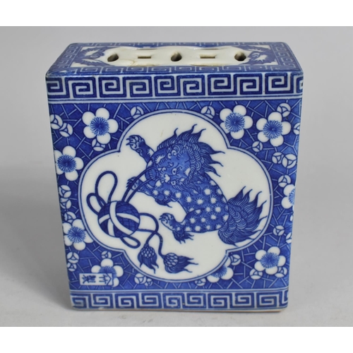 243 - A Chinese Porcelain Blue and White Opium Brick Decorated with Temple Lion Cartouche on Prunus Ground... 