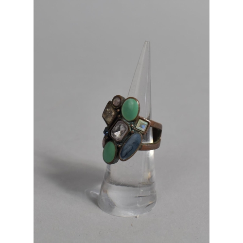 444 - A Ladies Dress Ring Set with Nine Polished Paste Stones and Enamel