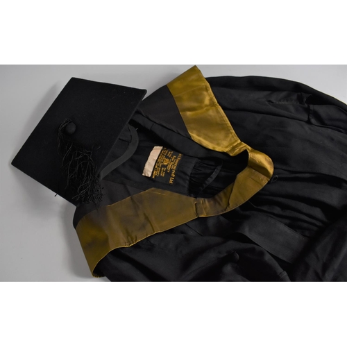 51 - An Early 20th Century Ede and Ravenscroft Academic Gown with Mortarboard, Size 7