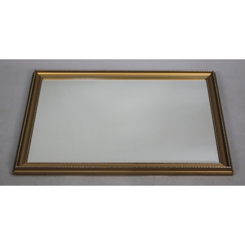 517 - A Modern Gilt Framed Rectangular Wall Mirror, 82x57cms