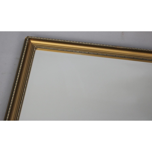 517 - A Modern Gilt Framed Rectangular Wall Mirror, 82x57cms