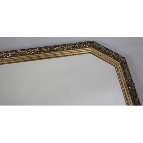 518 - A Modern Gilt Framed Wall Mirror, 104x60cms