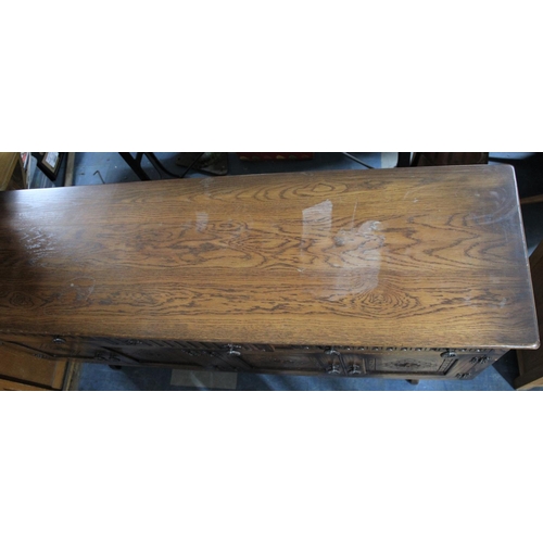 524 - A Mid 20th century Oak Sideboard with Three Top Drawers Over Cupboards, 167cm Wide