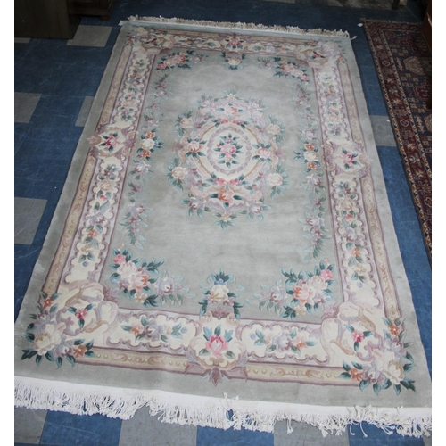 548 - A Chinese Patterned Woollen Rug, 282x181cms