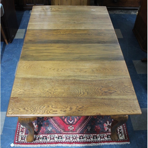 555 - A Late 19th/Early 20th Century Wind Out Oak Dining Table with One Leaf, 182cms by 107cms When Extend... 