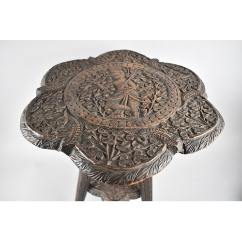 65 - A Scallop Edged Two Tier Carved Indian Table on Turned Tripod Supports, 38cms Diameter