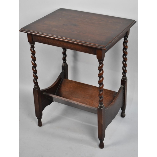 77 - A Mid 20th century Oak Barley Twist Book Rack and Reading Table, 52cms Wide