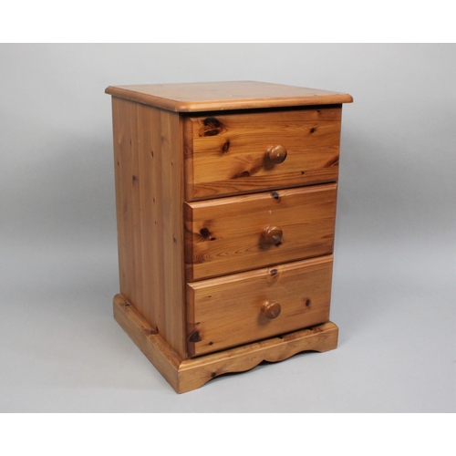 80 - A Modern Pine Three Drawer Bedside Chest, 43cms Wide