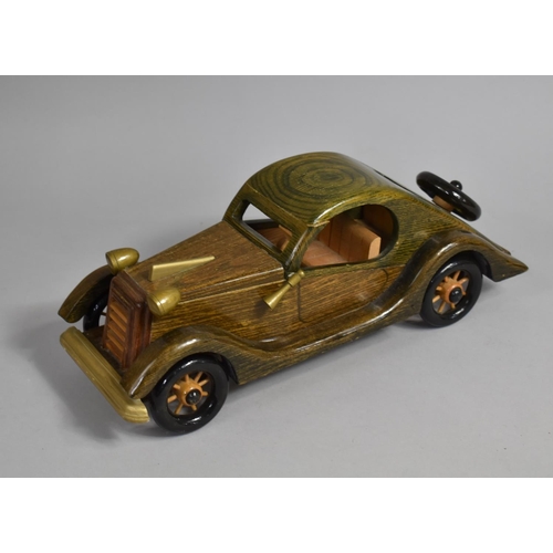 82 - A Modern Wooden Model of a Vintage Car, 37cms Long