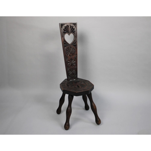 189 - A Carved Oak Spinning Chair, the Splat with Pierced Heart Motif