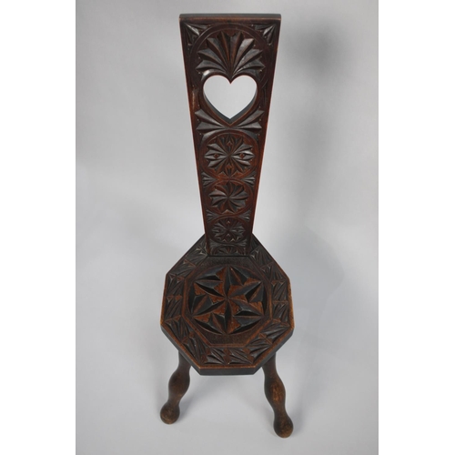 189 - A Carved Oak Spinning Chair, the Splat with Pierced Heart Motif