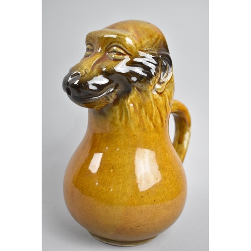 355 - A Late 19th/20th Century Novelty Treacle Glazed Jug in the Form of a Monkey, 22cm high