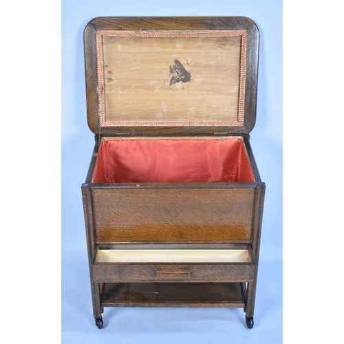 64 - A Mid 20th Century Oak Sewing Trolley with Hinged Lid to Top Storage Compartment, Centre Drawer and ... 