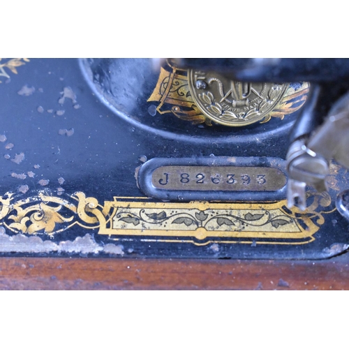 66 - A Vintage Cased Manual Singer Sewing Machine