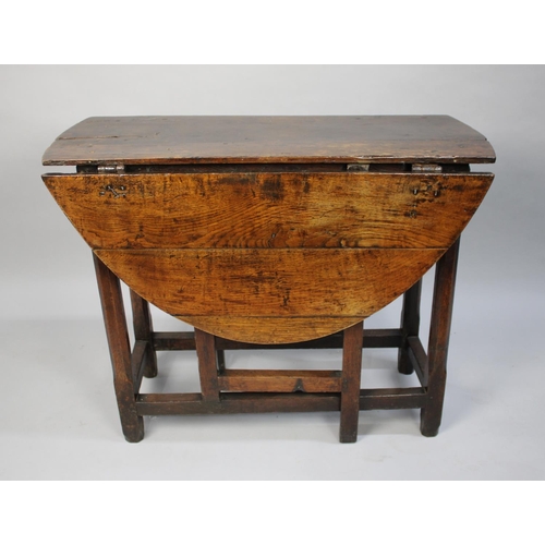 94 - A 19th century Oak Drop Leaf Gate Leg Table with Oak Top, 93cms Long