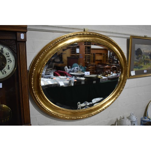 290 - A Oval Gilt Framed Bevel Edge Wall Mirror