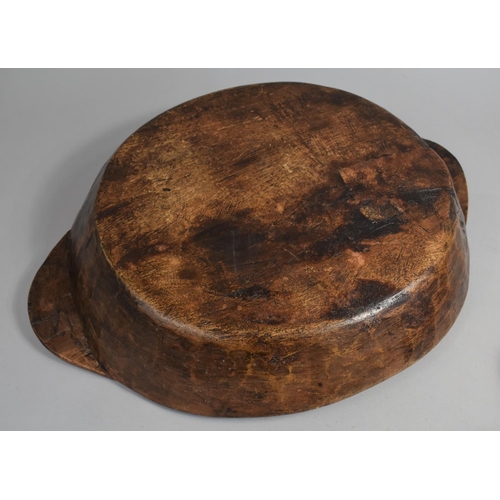 105 - A Vintage Wooden Tribal Two Handled African Bowl, 53cms Wide