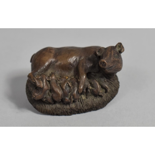 11 - A Small Bronze Study of Sow and Litter, 5.5cms Long