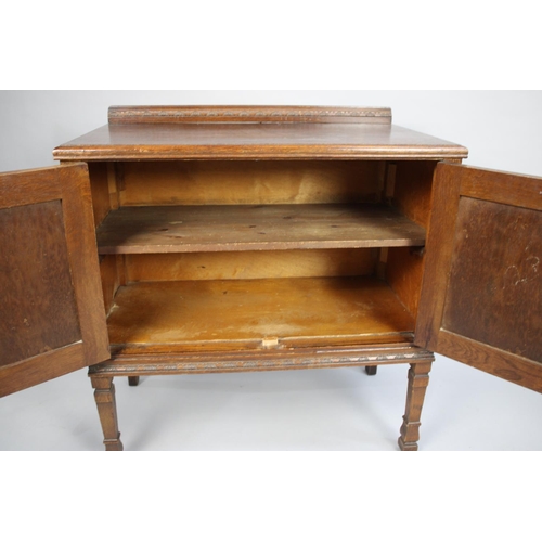 121 - A Victorian Galleried Oak Side Cabinet with Panelled Door, 77cms Wide
