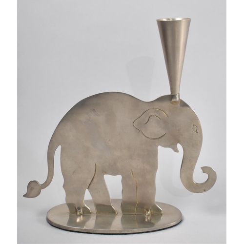 37 - A Brushed Stainless Steel Candlestick in the Form of an Elephant, 21cms High