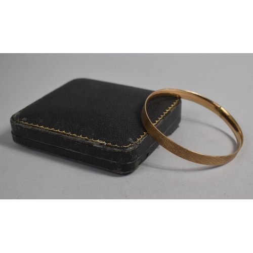 391 - A 9ct Gold Plated Bangle in Fitted Case