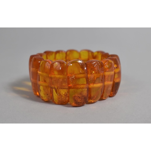 393 - An Amber Resin Type Sectional Expanding Bracelet