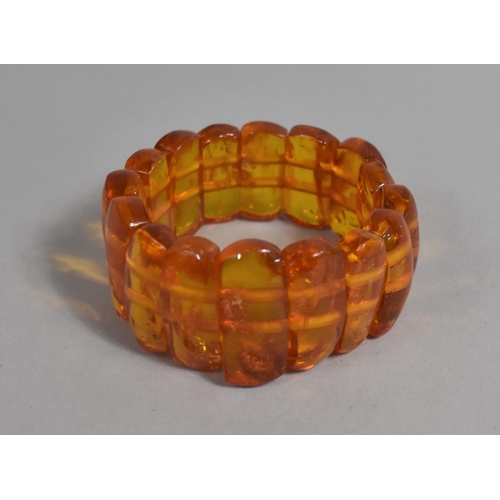 393 - An Amber Resin Type Sectional Expanding Bracelet