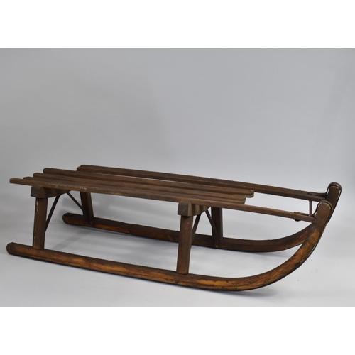 407 - A Vintage Wooden Sleigh with Wrought Iron Mounts, 97cms Long