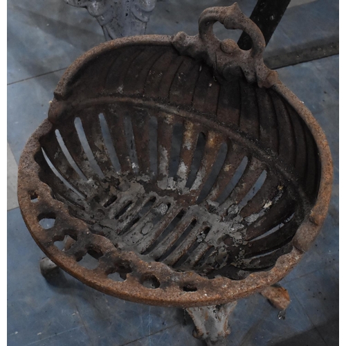 419 - A Cast Iron Fire Basket of Oval Form decorated with Scrolled Design on Quadrant Scrolled Pad Feet, 3... 