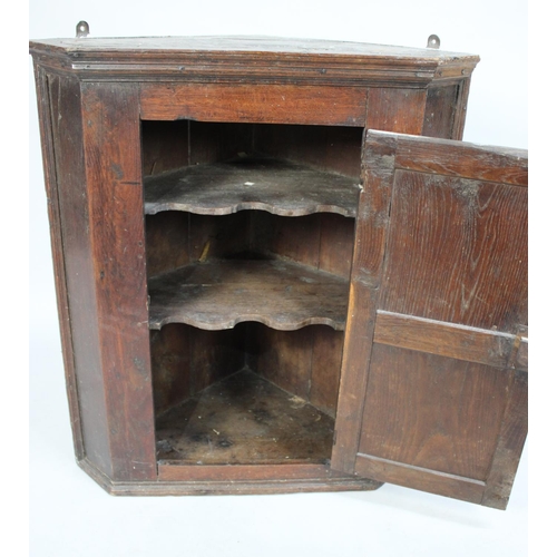 479 - A 19th Century Oak Wall Hanging Corner Cabinet with Panelled Door, 66cm wide