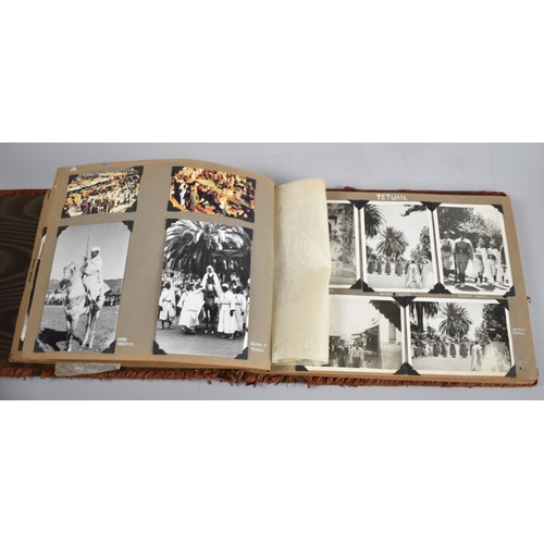 53 - A Mid 20th century Tooled Leather Photograph Album containing Photographs Taken on Trip to Tetouan, ... 