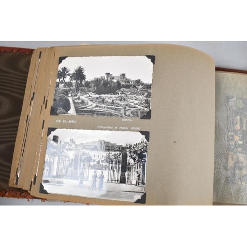 53 - A Mid 20th century Tooled Leather Photograph Album containing Photographs Taken on Trip to Tetouan, ... 