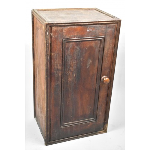 493 - A 19th Century Mahogany Side Cabinet with panelled Door to Shelved Interior, 75cms High and 41cms Wi... 