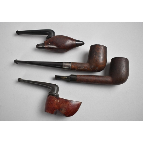 111 - A Collection of Four Vintage Carved and Briar Pipes