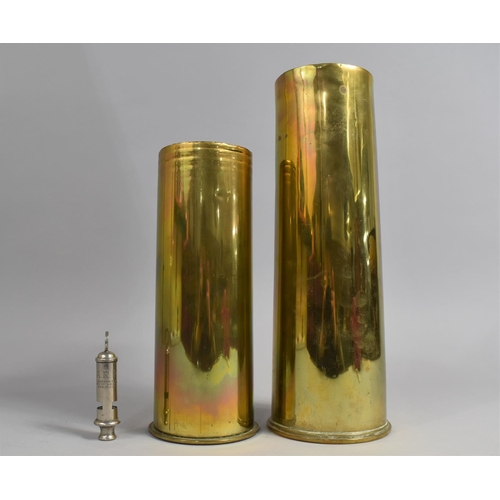 116 - Two WWI Brass Shell Cases Dated 1917, together with a WWII ARP Whistle