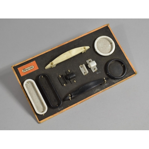 189 - A Mid 20th Century Tradesman Sample Set of Catches and Drawer Handles by Beacon, 22cm wide