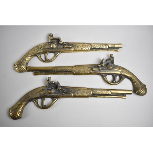 201 - Three Brass Half Models of Flintlock Pistols, Each 32cm Long