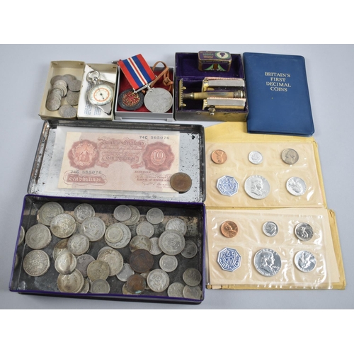 227 - A Collection of Various British Coins, Silver Coins, WWII Medal, Razor, Coin Set, Bank Notes etc