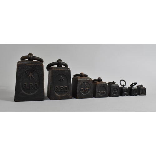 238 - A Collection of Graduated Cast Iron GPO Weights