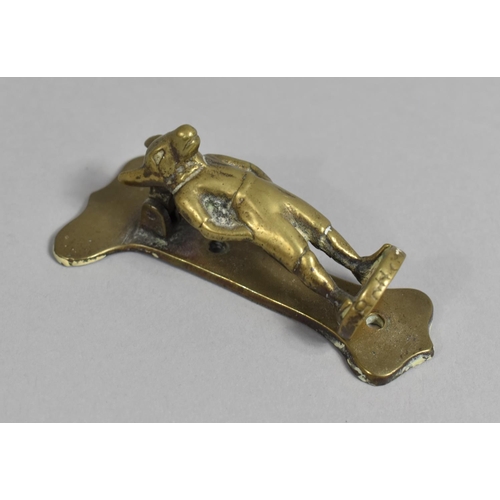 72 - A Vintage Brass Doorknocker in the Form of an Anthropomorphic Rabbit in Shorts, 9cms High