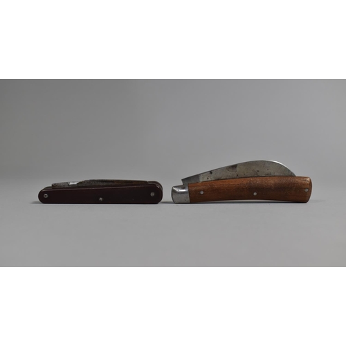 76 - A Folding Pruning Knife by Saynor together with a Similar Two Bladed Knife