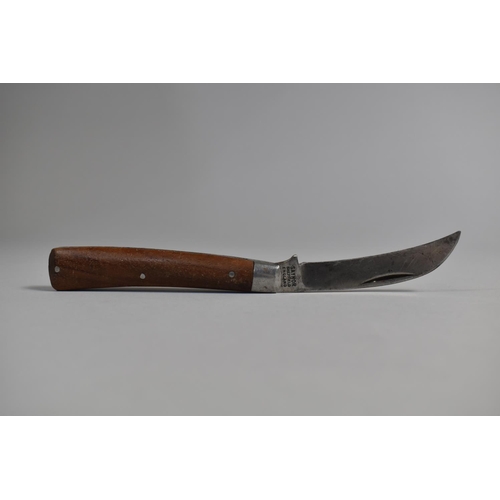 76 - A Folding Pruning Knife by Saynor together with a Similar Two Bladed Knife