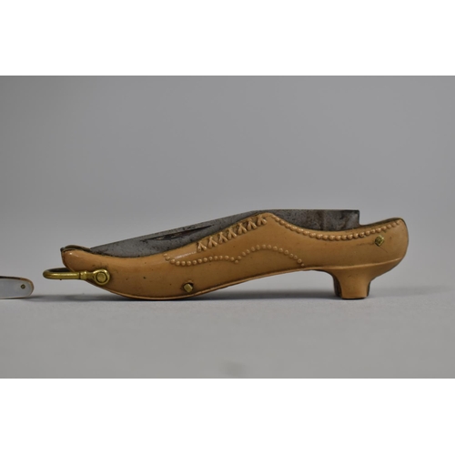 78 - A Vintage Novelty Folding Pocket Knife in the Form of a Ladies Shoe together with a Miniature Foldin... 