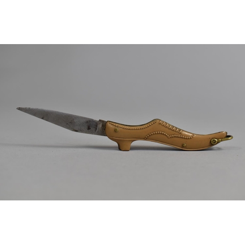 78 - A Vintage Novelty Folding Pocket Knife in the Form of a Ladies Shoe together with a Miniature Foldin... 