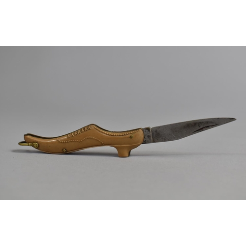 78 - A Vintage Novelty Folding Pocket Knife in the Form of a Ladies Shoe together with a Miniature Foldin... 